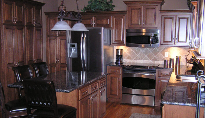 Traditional kitchen remodel done with cabinet refacing