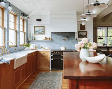 timeless kitchen with hardwood flooring and baby blue backsplash