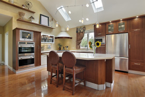 Luxury kitchen with redwood cabinetry and center island